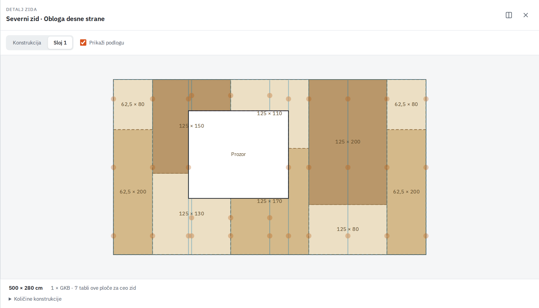 Raspored gipsanih ploča i isečenih komada oko prozora.